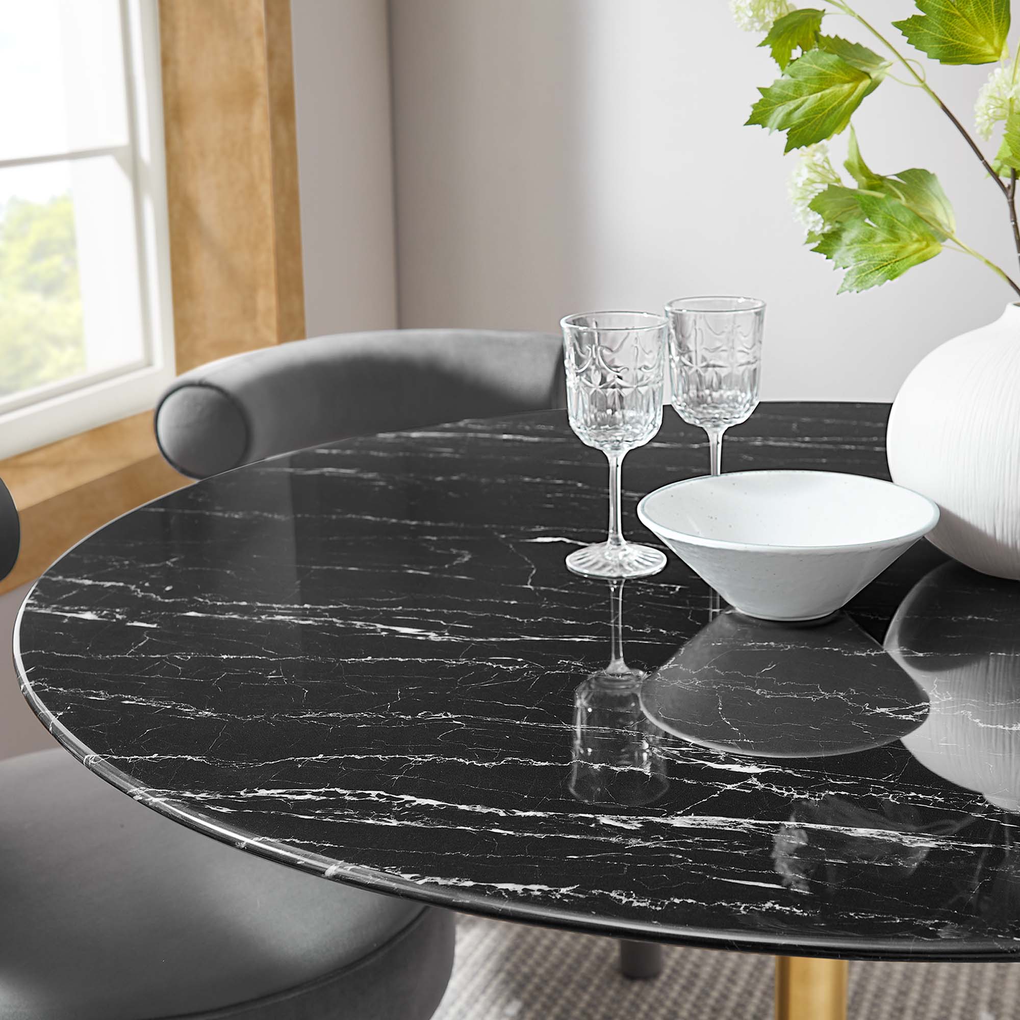 48" marble tulip table Gold base with black top